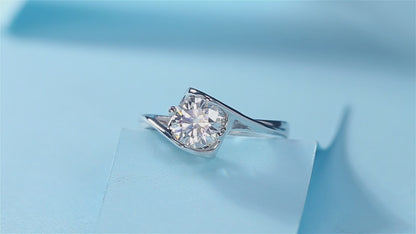 Wome's 1ct 6.5MM Moissanite ring in sterling silver with radiant simplicity