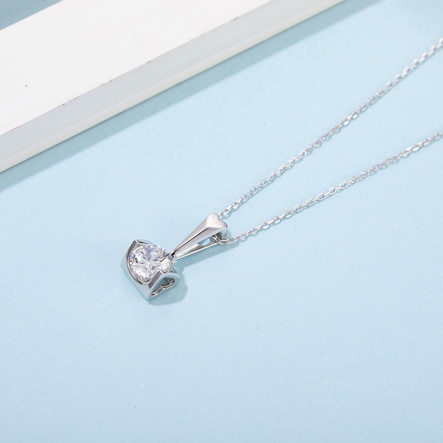 6.5mm Moissanite Pendant on Sterling Silver Cuban Chain: Pure Brilliance