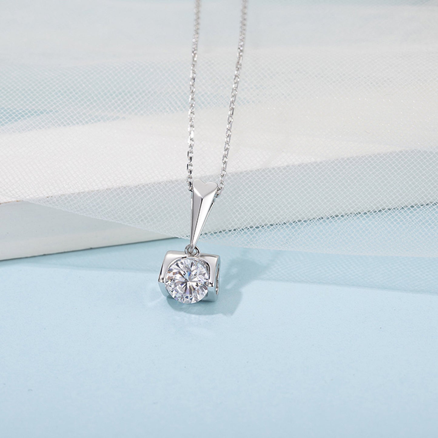 6.5mm Moissanite Pendant on Sterling Silver Cuban Chain: Pure Brilliance