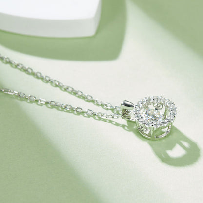 The Moving Moissanite Necklace: The Spinning Gem