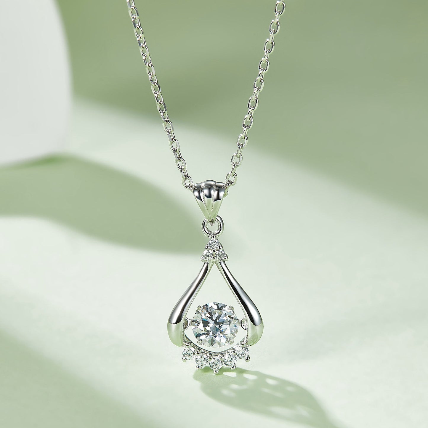 Spin Moissanite Pendant on Silver Chain:  Elegance