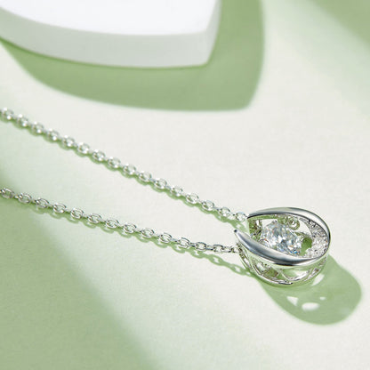 Whirling Radiance: Moissanite Necklace with Round Cut