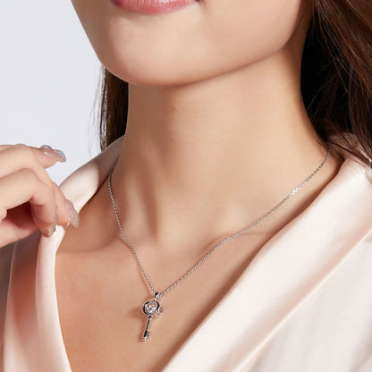 Moissanite pendant with rotating brilliance on a silver chain