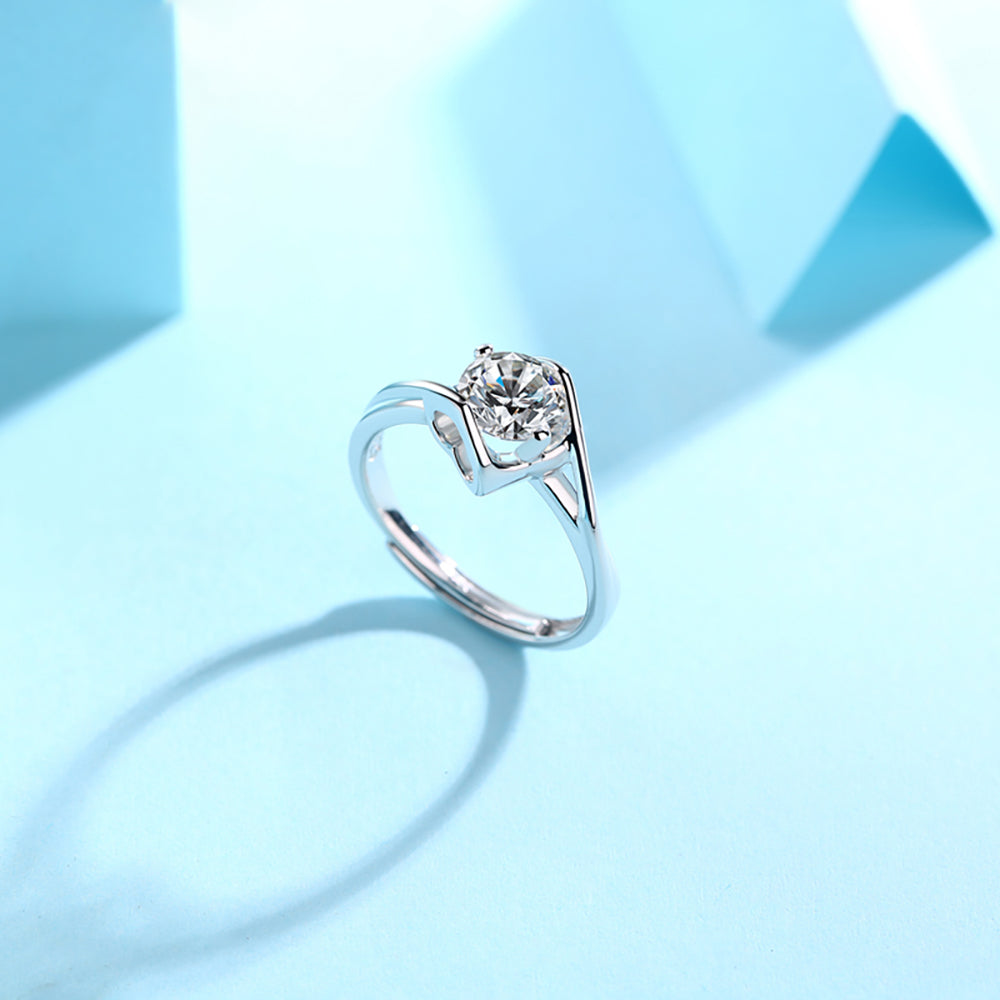 Wome's 1ct 6.5MM Moissanite ring in sterling silver with radiant simplicity