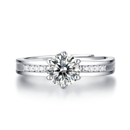 Women's 1ct 6.5MM Moissanite ring set in sterling silver with a glittering solitaire